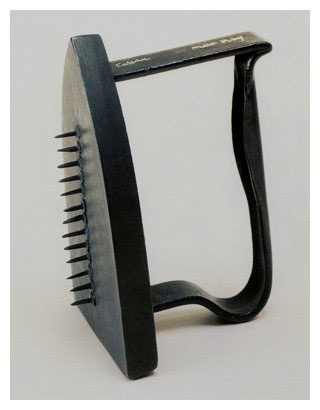 اثری از Man Ray با نام کادو یا هدیه